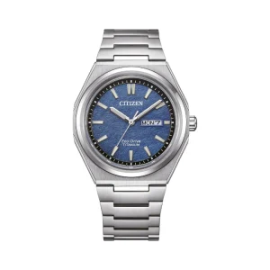 Reloj Citizen Eco-Drive Super Titanium con esfera azul texturizada de estilo papel japonés, ventana de día y fecha, y brazalete integrado de titanio.